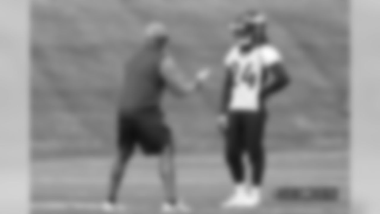 Defensive Backs Coach Greg Williams and Adam Jones during practice at UCHealth Training Center on September 5, 2018.
