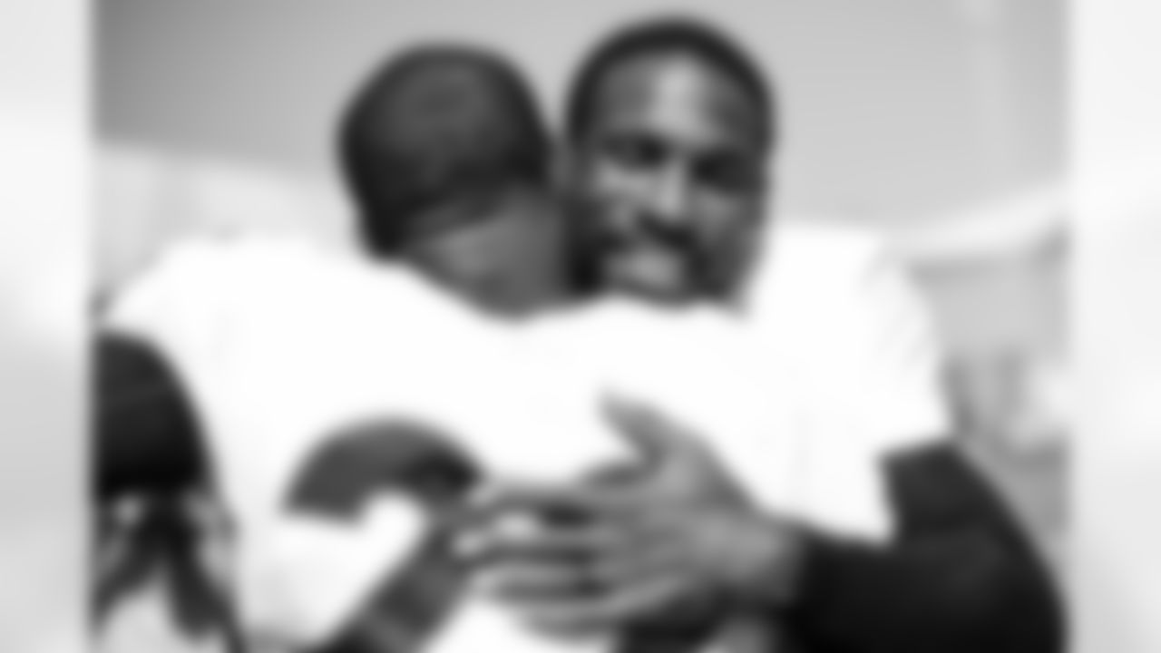 Kareem Jackson gets a hug from Vikings cornerback Patrick Peterson during a joint practice with the Minnesota Vikings amid training camp at TCO Performance Center on August 12, 2021. (Photo by Ben Swanson)