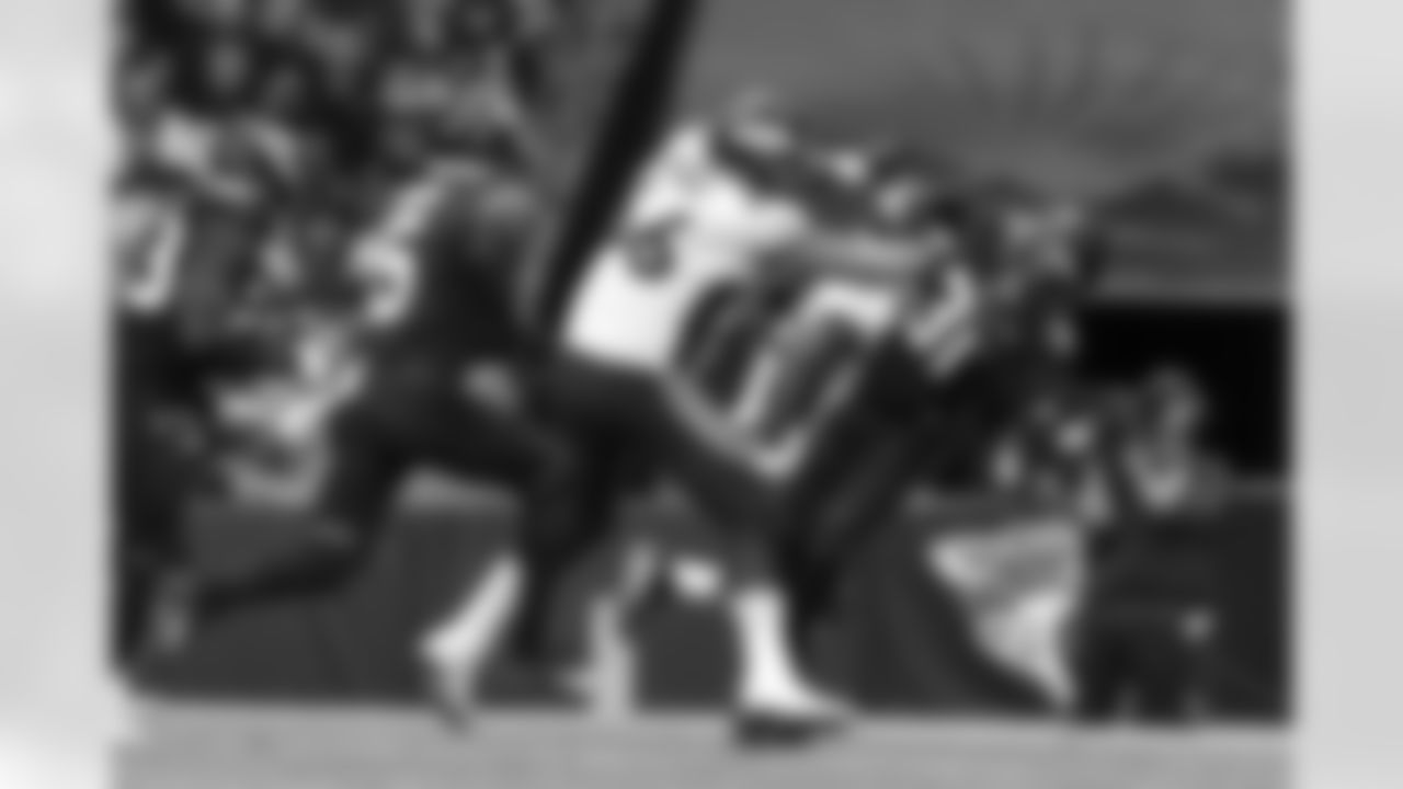 Denver Broncos guard Dalton Risner (66) blocks for running back Melvin Gordon III (25) during an international NFL game against the Jacksonville Jaguars on Sunday, October 30, 2022 in London.
Photo by Gabriel Christus / Denver Broncos