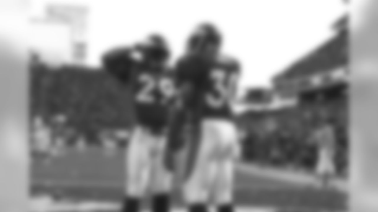 Howard Griffith salutes with Terrell Davis after Griffith's touchdown against the New York Jets at Mile High Stadium in Denver, CO on January 17, 1999.