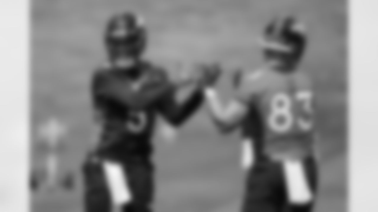 Teddy Bridgewater and Andrew Beck during the 10th day of OTA practices at UCHealth Training Center on June 10, 2021. (Photo by Ben Swanson)