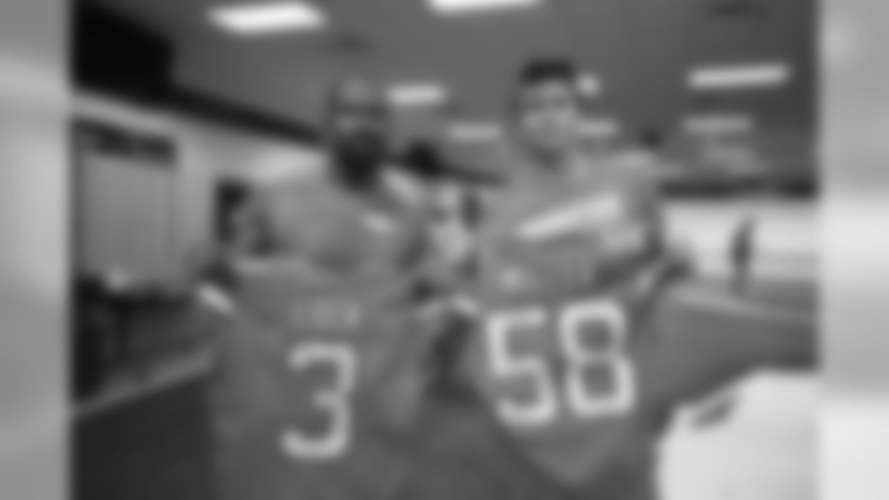 Denver Broncos linebacker Von Miller (58) and quarterback Drew Lock (3) swap jerseys in the locker room after the NFL game against the Detroit Lions at Empower Field at Mile High in Denver, Colorado, December 22, 2019.
Photo by Gabriel Christus