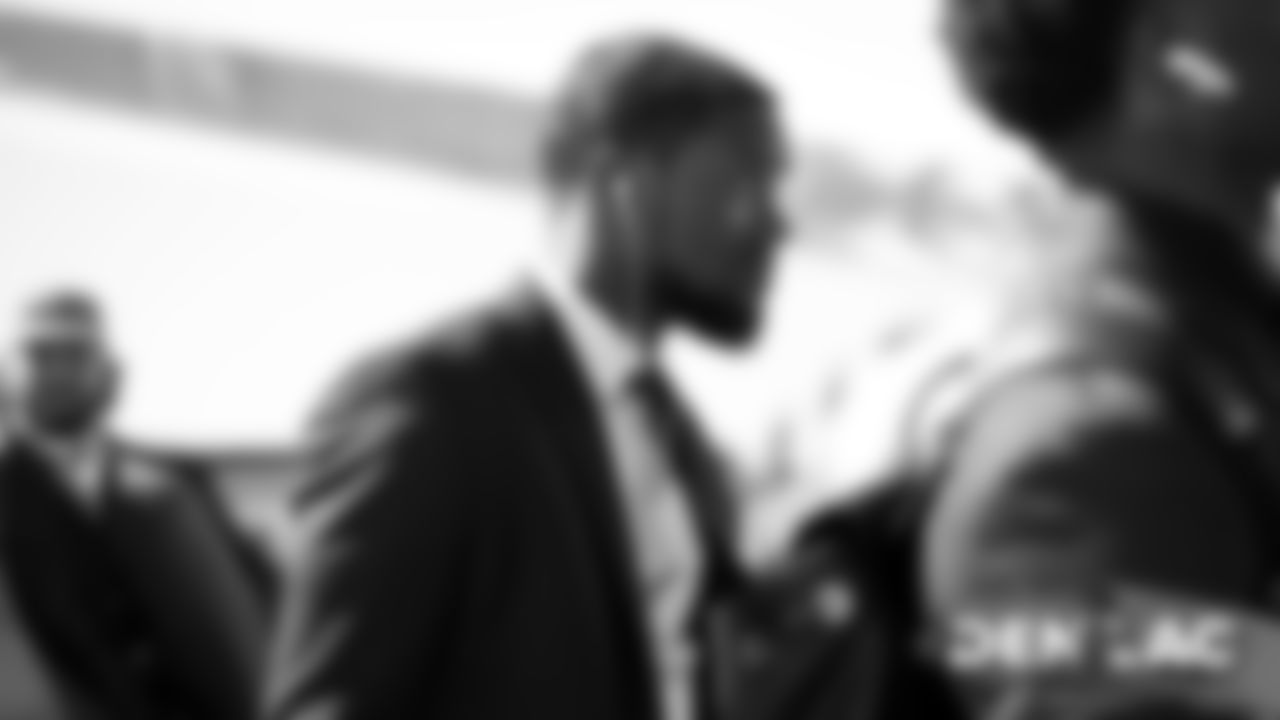 De'Vante Bausby on the tarmac at Denver International Airport during the team's travel to California on October 5, 2019 ahead of their Week 5 game against the Los Angeles Chargers. (Photo by Ben Swanson)