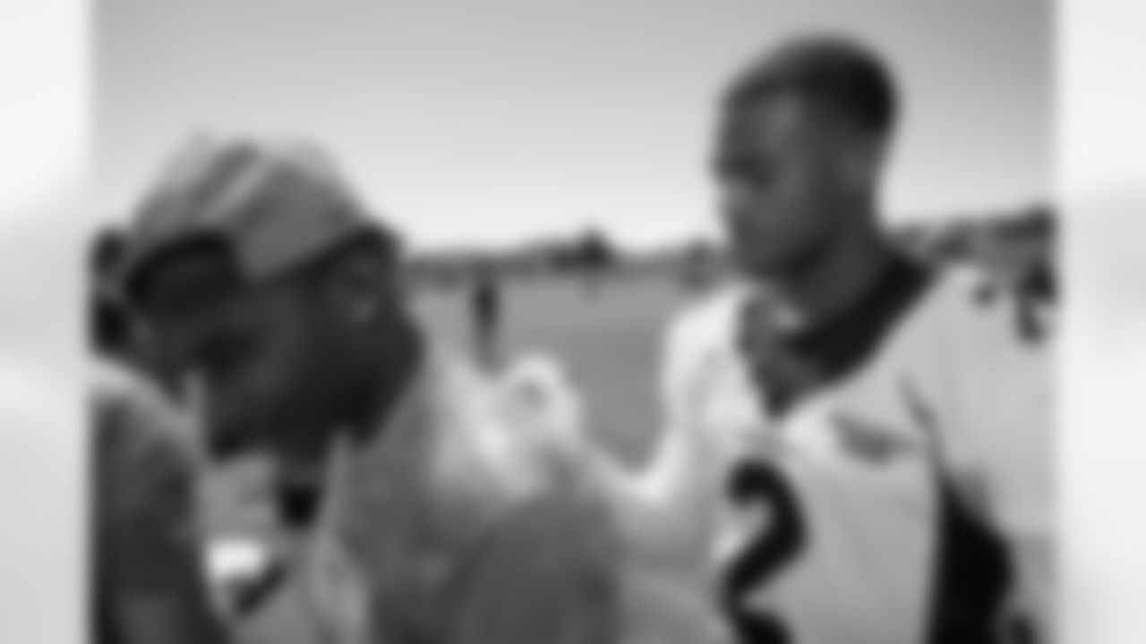 Pat Surtain II signs autographs for military members during USAA's Salute to Service NFL Boot Camp at Centura Health Training Center on August 29, 2023 in Englewood, Colorado. Photo by Ben Swanson / Denver Broncos
