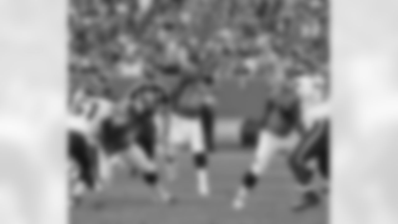 Manning fires downfield.
