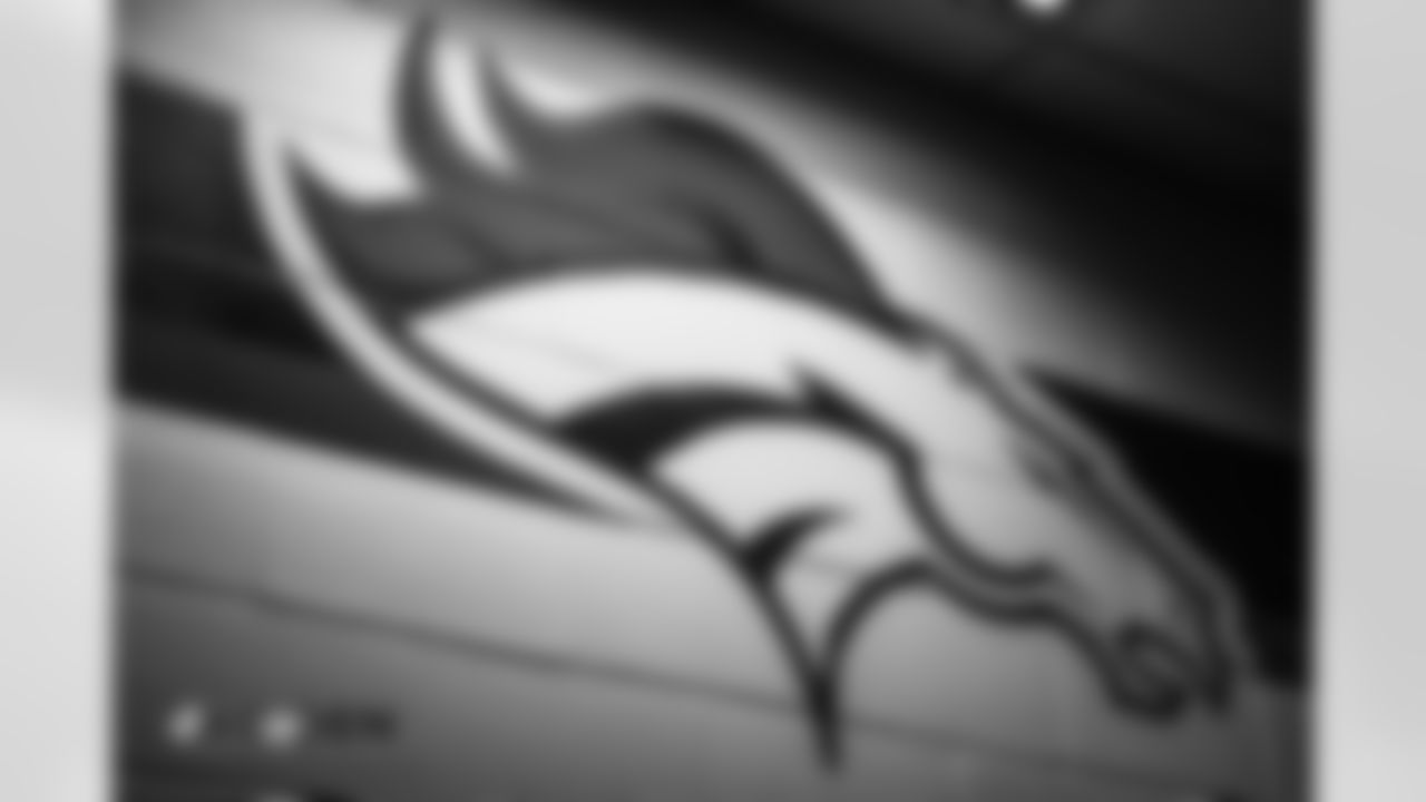 The Broncos' logo on a wall in the locker room pregame before the Broncos' Week 4 game against the Kansas City Chiefs at Broncos Stadium at Mile High on October 1, 2018.