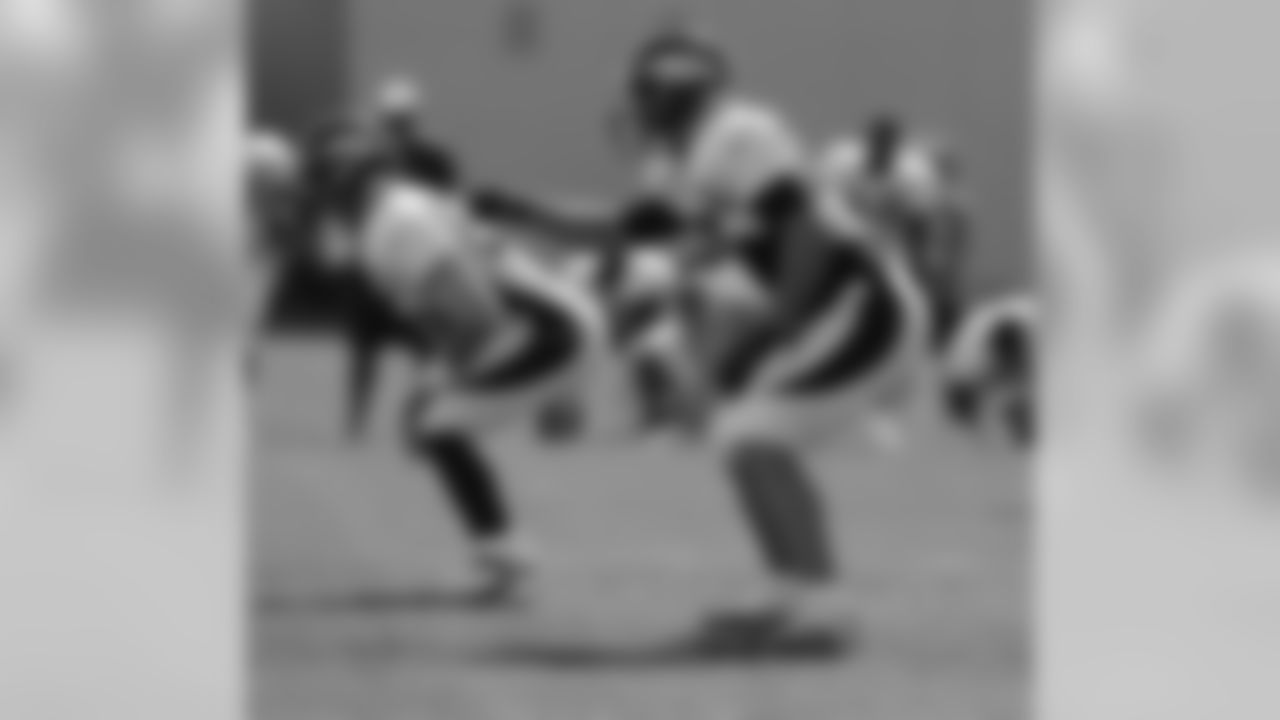 Brooking calls out the defensive signals.