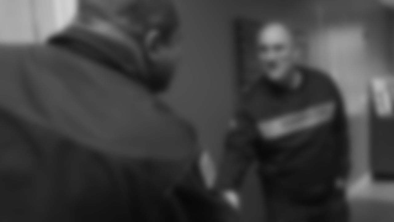 Head Coach Vic Fangio introduces himself to members of Aurora Fire Station 13 during a visit for Random Acts of Kindness Week on February 20, 2019.
