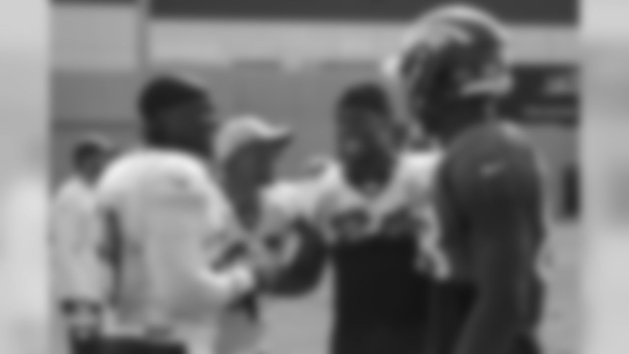 Former Broncos LB Danny Trevathan, cornerback Chris Harris Jr. (25), inside linebacker Brandon Marshall (54) and wide receiver Demaryius Thomas (88) share a laugh during a joint training camp practice with the Chicago Bears at UCHealth Training Center on August 16, 2018.