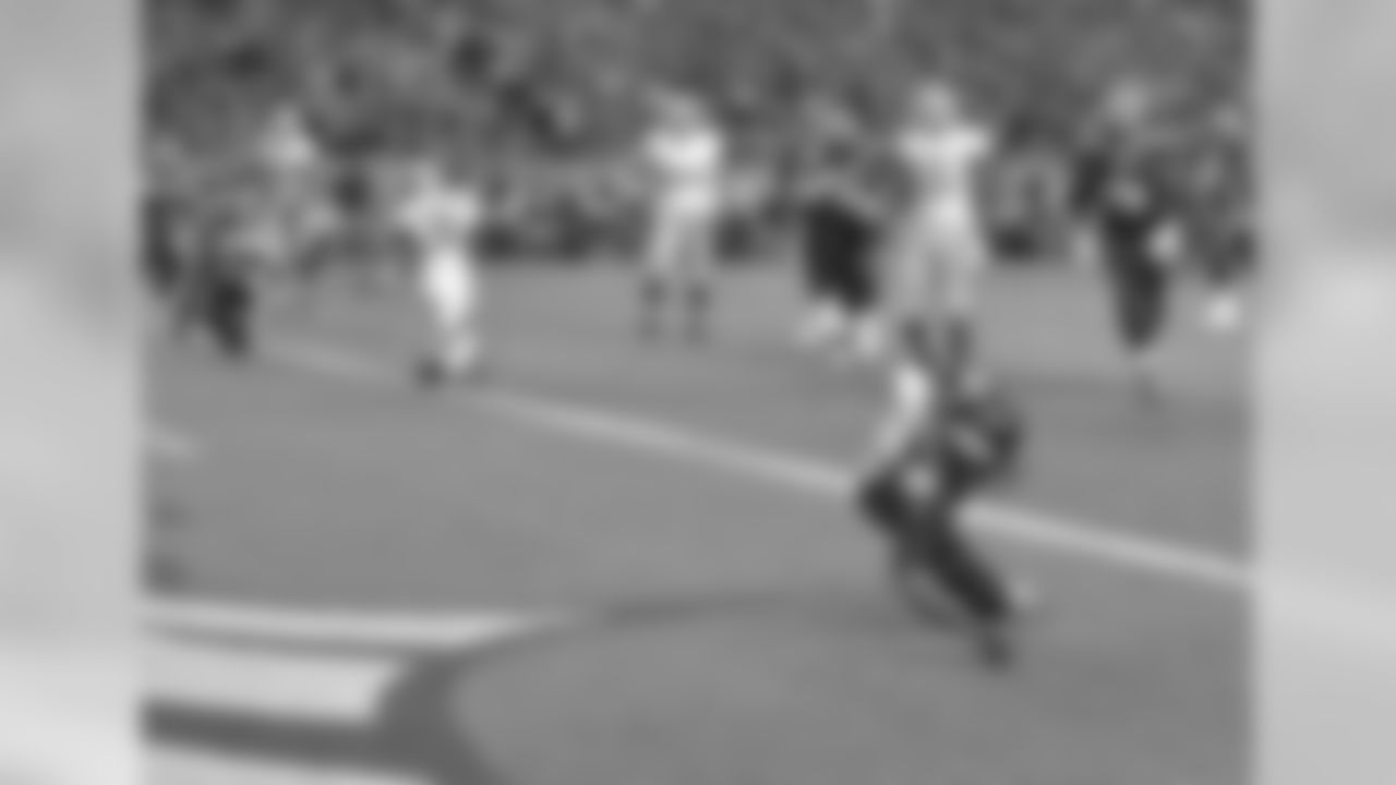 After his defender ran into the referee, Sanders caught a 3-yard pass from Manning to get his first TD as a Bronco.