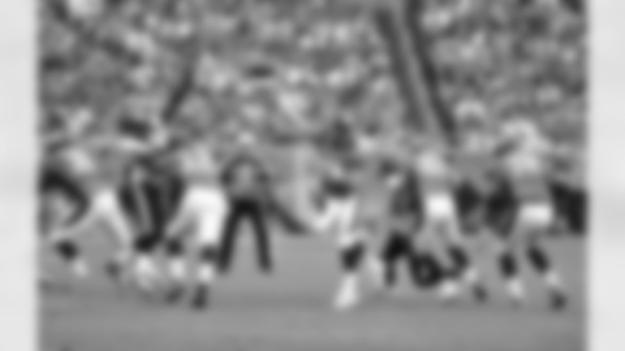 QB Peyton Manning fires a pass as the Broncos began their fourth-quarter comeback.