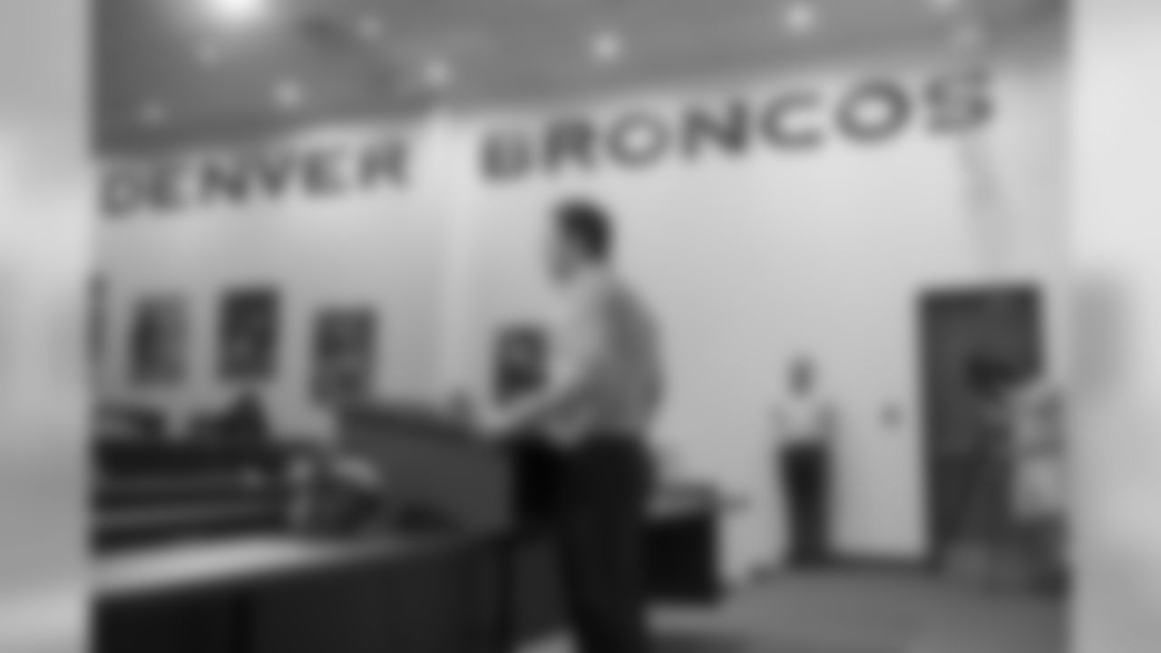 Welker meets the media at his introductory press conference.