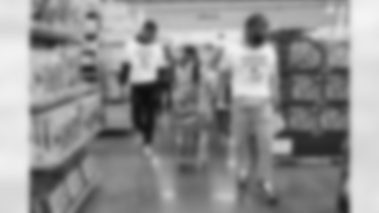 Pat Surtain II and Kareem Jackson shop with kids from the Boys and Girls Club on Monday, December 12, 2022 at a local store in Parker, Colorado. Kareem Jackson hosted his annual Shop with a Jock event to provide kids with a holiday shopping experience.
Photo by Gabriel Christus/Denver Broncos