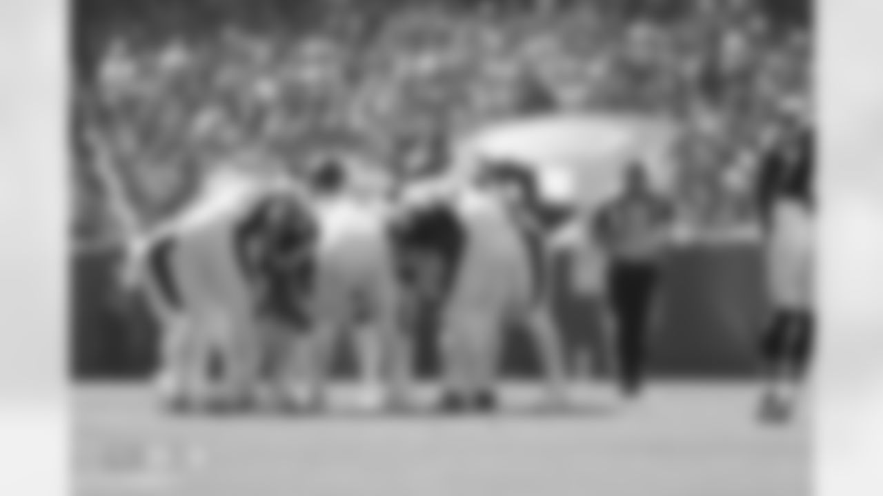 The offense huddles during the Broncos' Week 4 game against the Chicago Bears at Soldier Field in Chicago, Illinois on October 1, 2023. Photo by Gabriel Christus / Denver Broncos