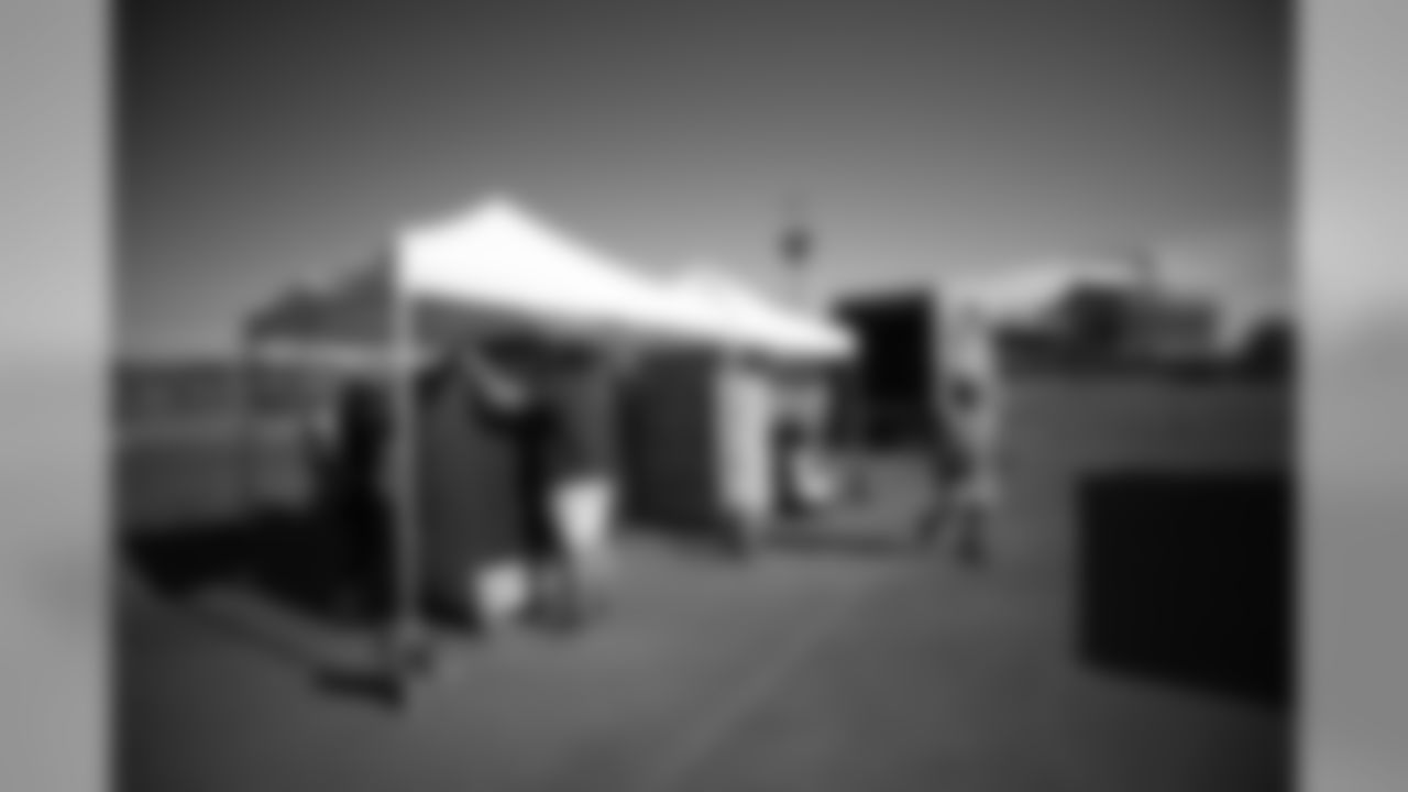 Volunteers during the second mobile pantry distribution with Food Bank of the Rockies on Friday, June 26, 2020 at Empower Field at Mile High in Denver, Colorado.
Photo by Gabriel Christus