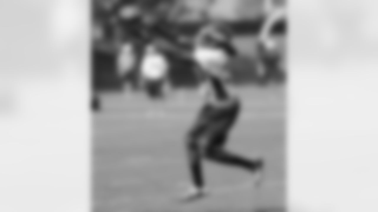 Bruton makes a catch during position drills.