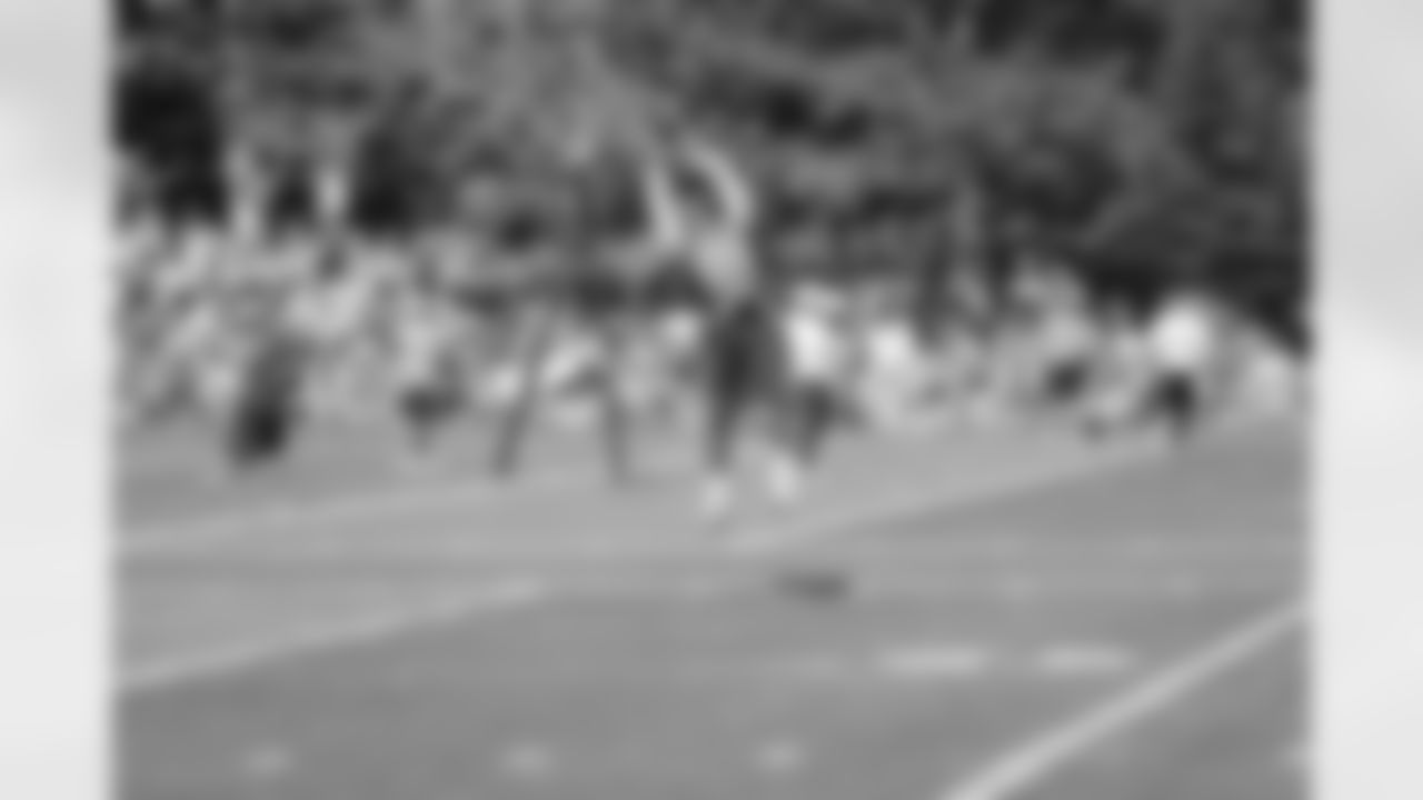CB Joshua Moore brings in the ball at its highest point.