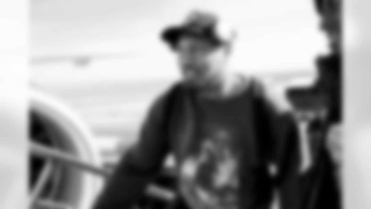 Bradley Chubb on the tarmac at Denver International Airport on October 16, 2022 during the team's travel to Los Angeles for a Week 6 game against the Chargers. (Photo by Ben Swanson)