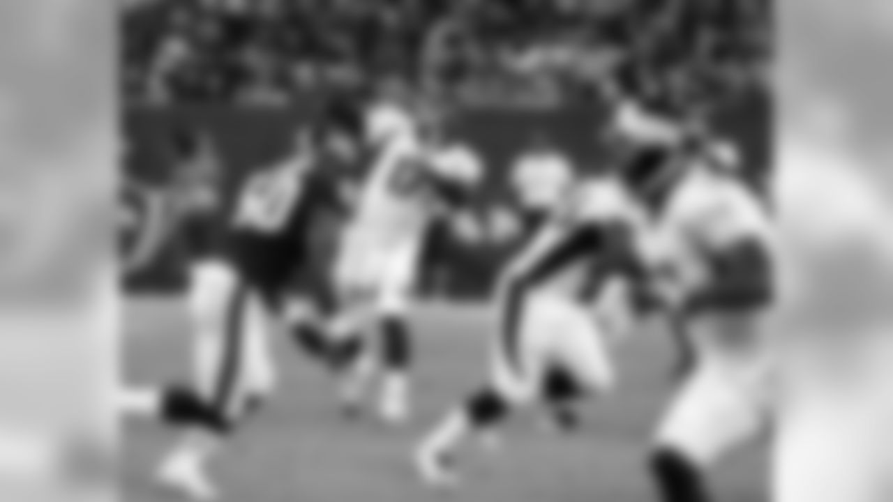 quarterback Brock Osweiler (17)