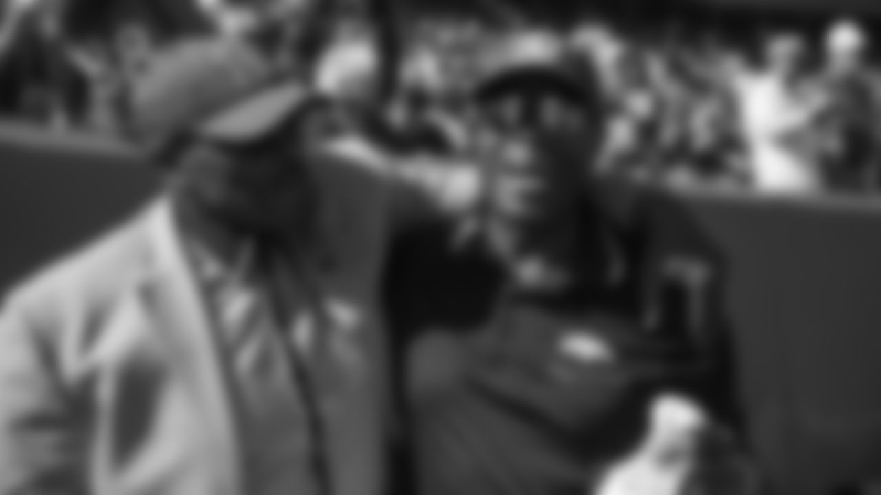 Floyd Little and Rick Upchurch before the Broncos' game against the Tennessee Titans at Empower Field at Mile High on October 13, 2019. (Photo by Ben Swanson)