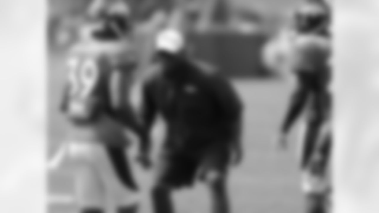 Assistant Secondary Coach Sam Garnes instructs the safeties during practices.
