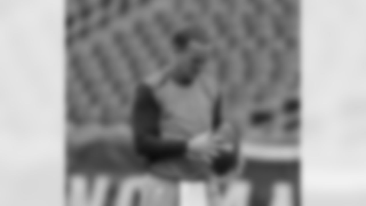 QB Peyton Manning prepares to throw a pass during pregame before his team's battle with the New England Patriots.