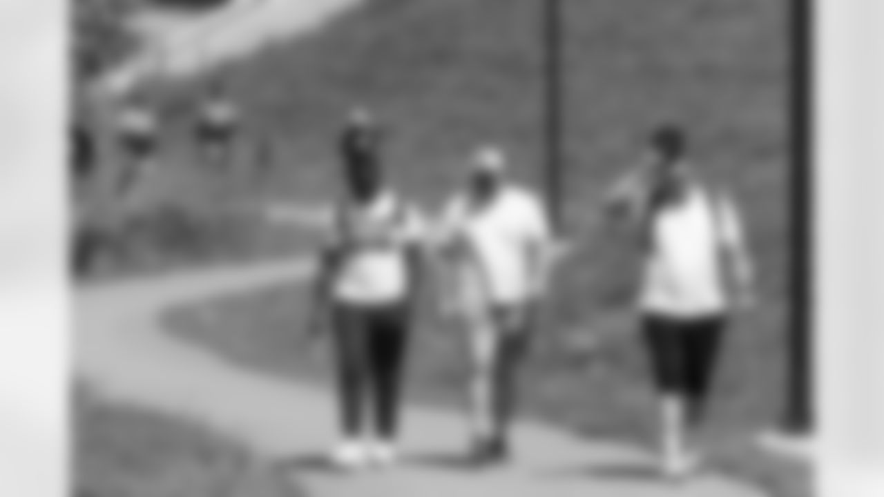 Calvin Anderson, Graham Glasgow and Garett Bolles walk to the TCO Performance Center for a walkthrough on Friday, August 13, 2021 at TCO Performance Center in Eagan, Minnesota.
Photo by Gabriel Christus