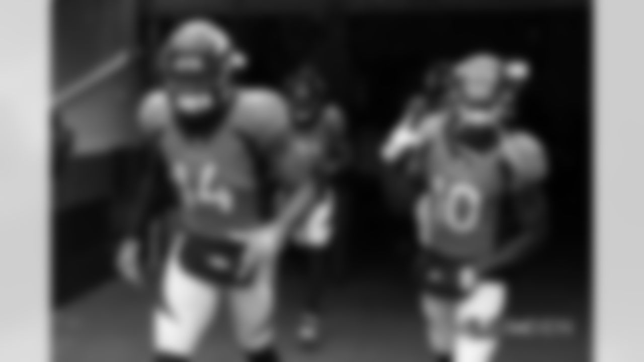 Courtland Sutton and Emmanuel Sanders run out of the tunnel before the game against the Los Angeles Rams during the game at Broncos Stadium at Mile High in Denver, Colorado, October 14, 2018.
Photo by Gabriel Christus