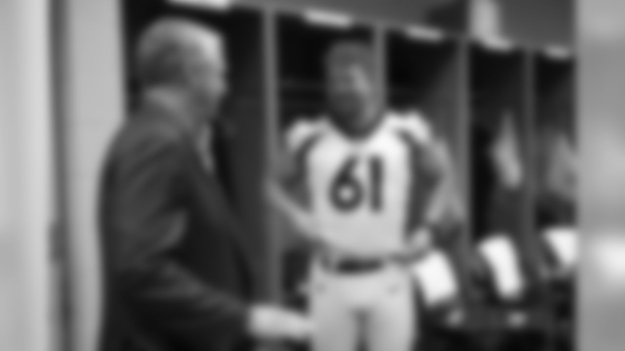 Matt Paradis speaks with President and CEO Joe Ellis after the NFL preseason game against the Arizona Cardinals at University of Phoenix Stadium in Glendale, Arizona, August 30, 2018.
Photo by Gabriel Christus