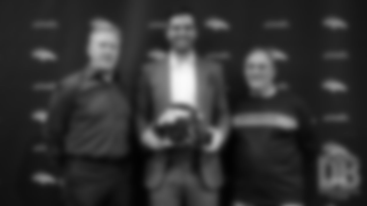 Joe Flacco poses for a photo alongside President of Football Operations/General Manager John Elway and Head Coach Vic Fangio during his first day as a Bronco at UCHealth Training Center following a trade to Denver on March 15, 2019.