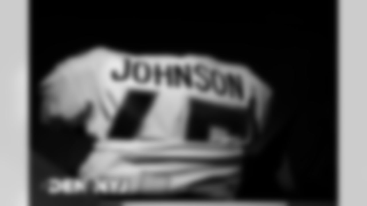 Alexander Johnson's jersey in the equipment room before the Broncos' Week 4 game against the New York Jets at MetLife Stadium in East Rutherford, New Jersey. (Photo by Ben Swanson)
