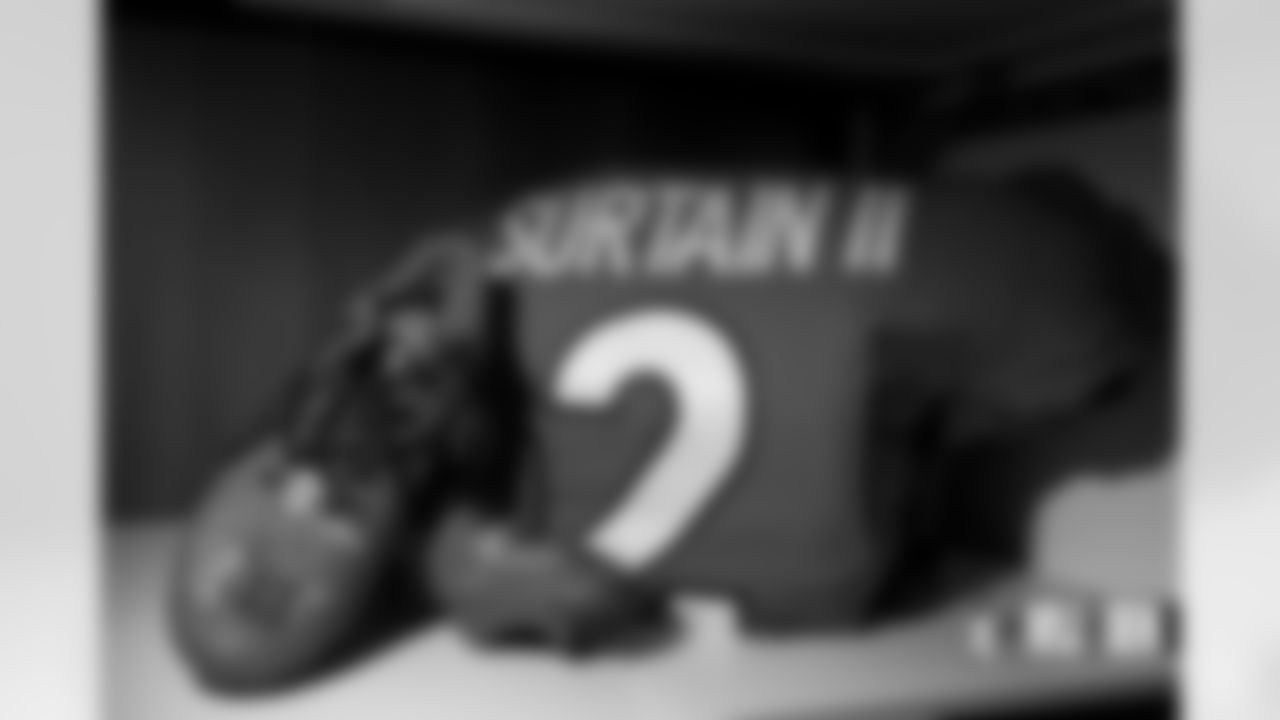 Pat Surtain II's jersey and cleats in the locker room before the Broncos' Week 7 game against the New York Jets at Empower Field at Mile High in Denver, Colorado on October 23, 2022. (Photo by Ben Swanson)