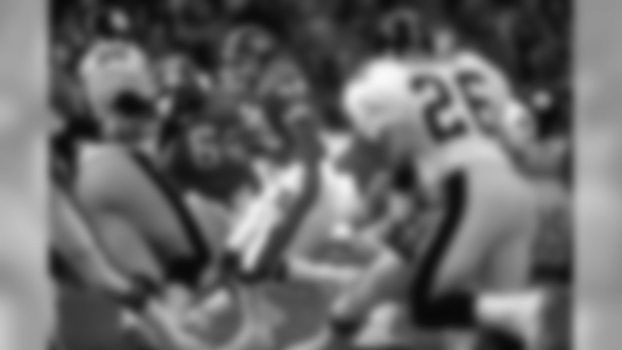 Running back Steve Sewell runs the ball during a game against the Pittsburgh Steelers.