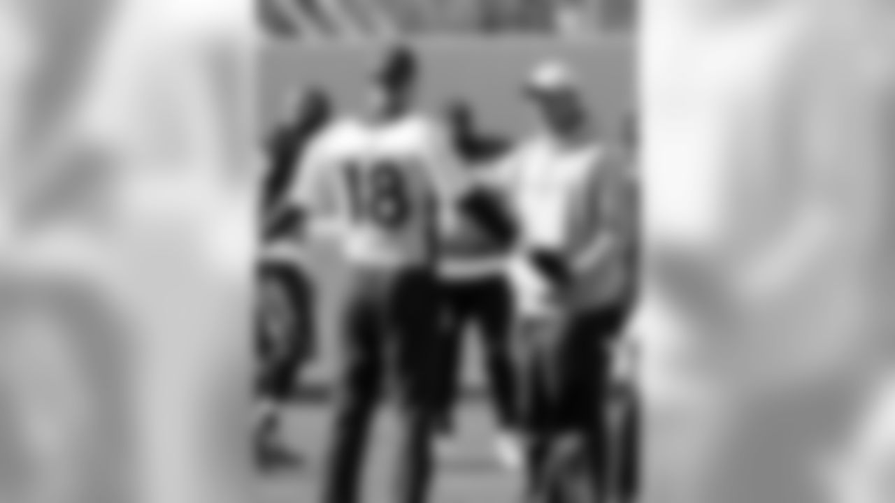 Peyton Manning and Adam Gase