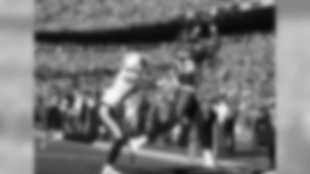 Thomas catches a 13-yard pass from Manning to open Denver's scoring.