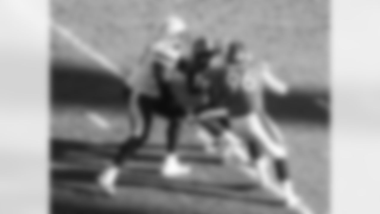 Mitch Unrein and Jeremy Mincey
