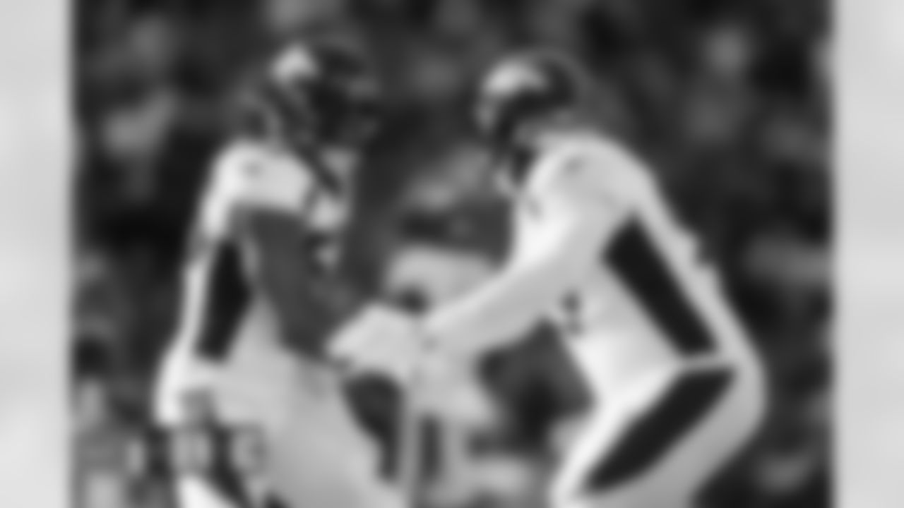 Jonathon Cooper and DeShawn Williams during the Broncos' Week 17 game against the Kansas City Chiefs at GEHA Field at Arrowhead Stadium in Kansas City, Missouri on January 1, 2023. Photo by Gabriel Christus