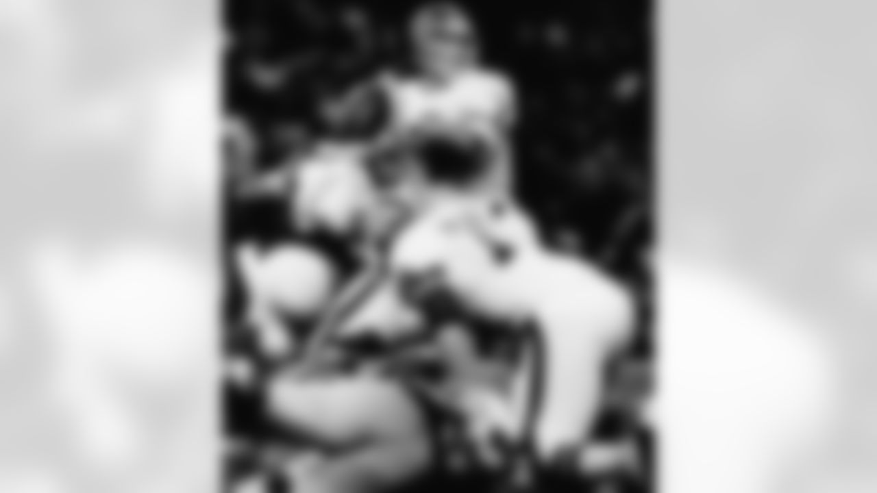 John Elway's legend grew in particular because of his ability to lead the Broncos to remarkable comebacks in particularly bleak circumstances. In 1985 alone, he helped the Broncos to six fourth-quarter backs with six game-winning drives, according to Pro Football Reference. In the game pictured, Elway threw for 432 yards and a touchdown as the Broncos scored 17 fourth-quarter points to upend the Seahawks in Seattle's Kingdome. (AP Photo)