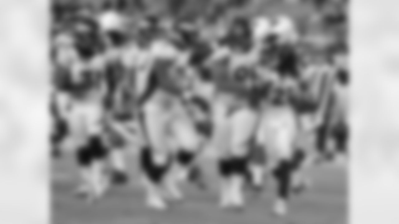 Cornerback Syd'Quan Thompson celebrates an interception during second half action.