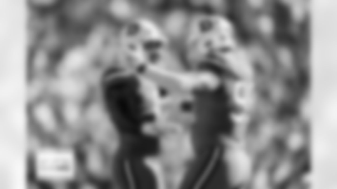 Denver Broncos linebacker Jonathon Cooper (0) and defensive end Zach Allen (99) celebrate after a play during the Broncos' Week 5 game against the New York Jets at Empower Field at Mile High in Denver, Colorado on October 8, 2023. Photo by Gabriel Christus / Denver Broncos