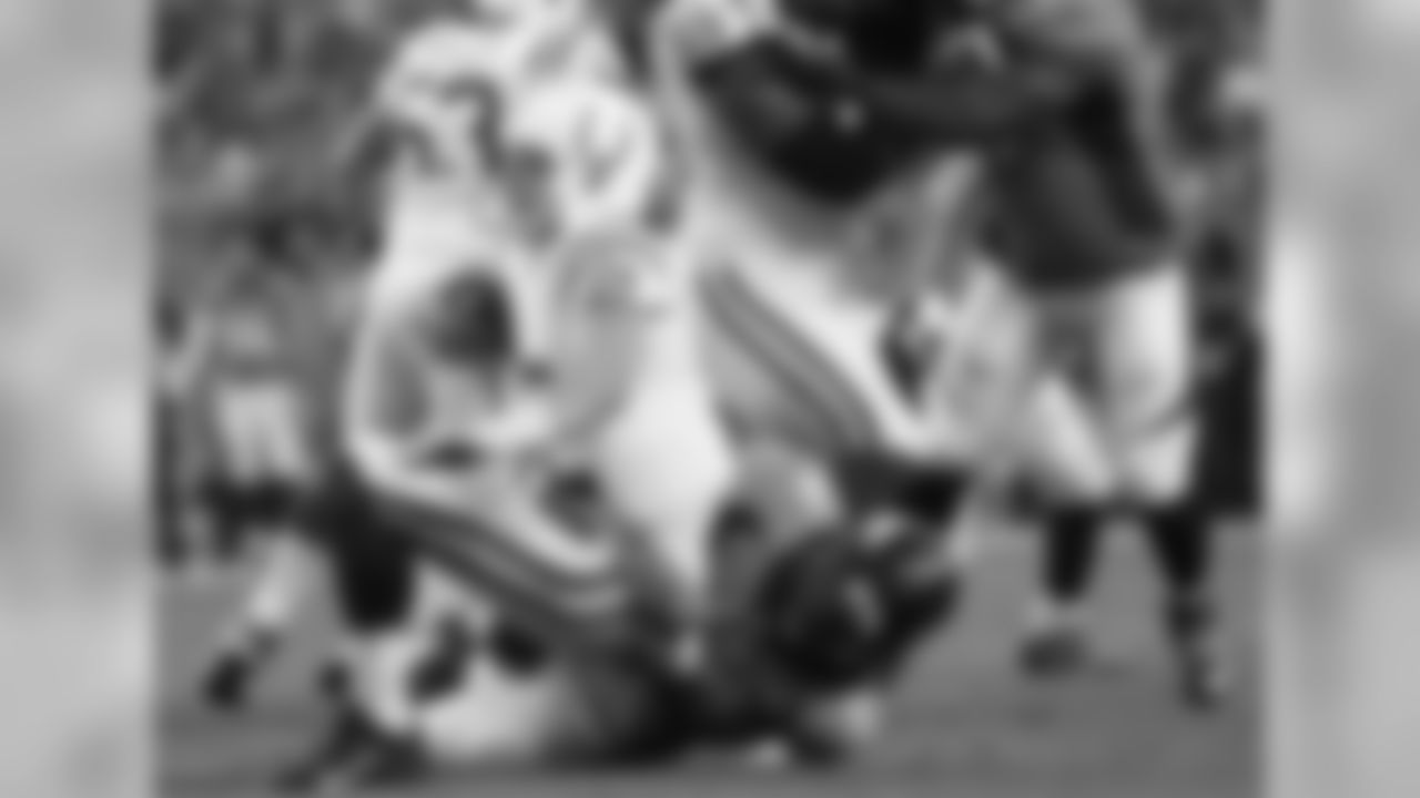 LB Nate Irving and Colts QB Andrew Luck