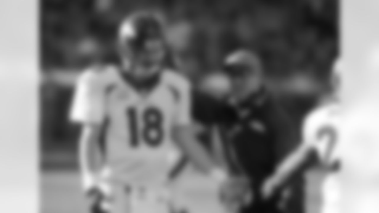 Peyton Manning and John Fox