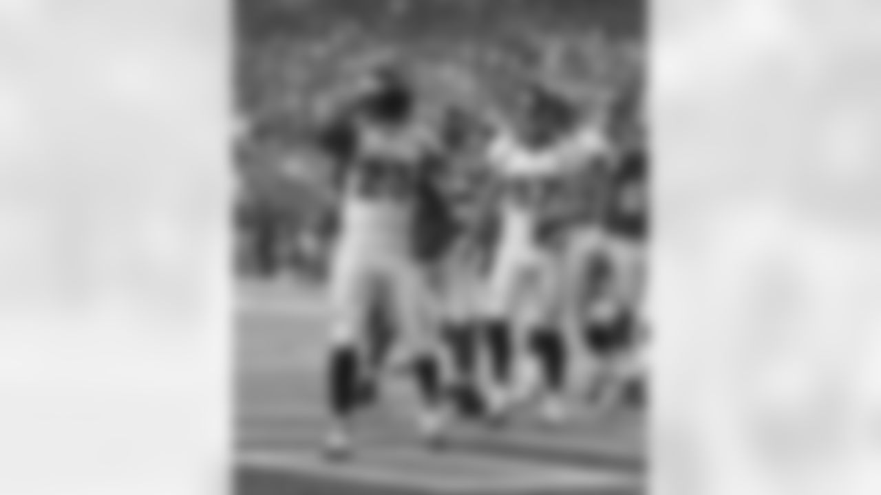 McGahee celebrates one of his two fourth-quarter touchdowns.