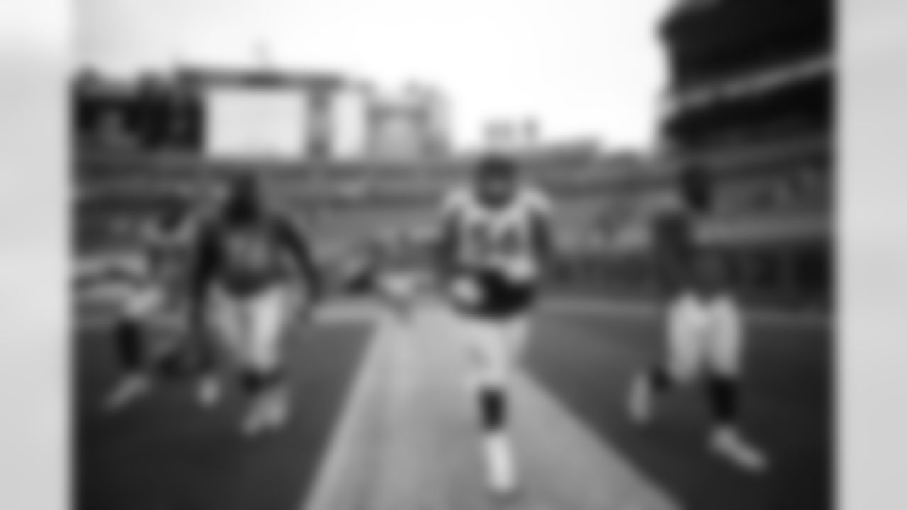 Christian Covington runs onto the field during practice on Day 12 of training camp at Empower Field at Mile High on August 29, 2020. (Photo by Ben Swanson)