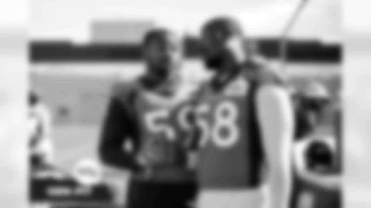 Malik Reed and Von Miller during practice at UCHealth Training Center in Englewood, Colorado on October 8, 2021. (Photo by Ben Swanson)