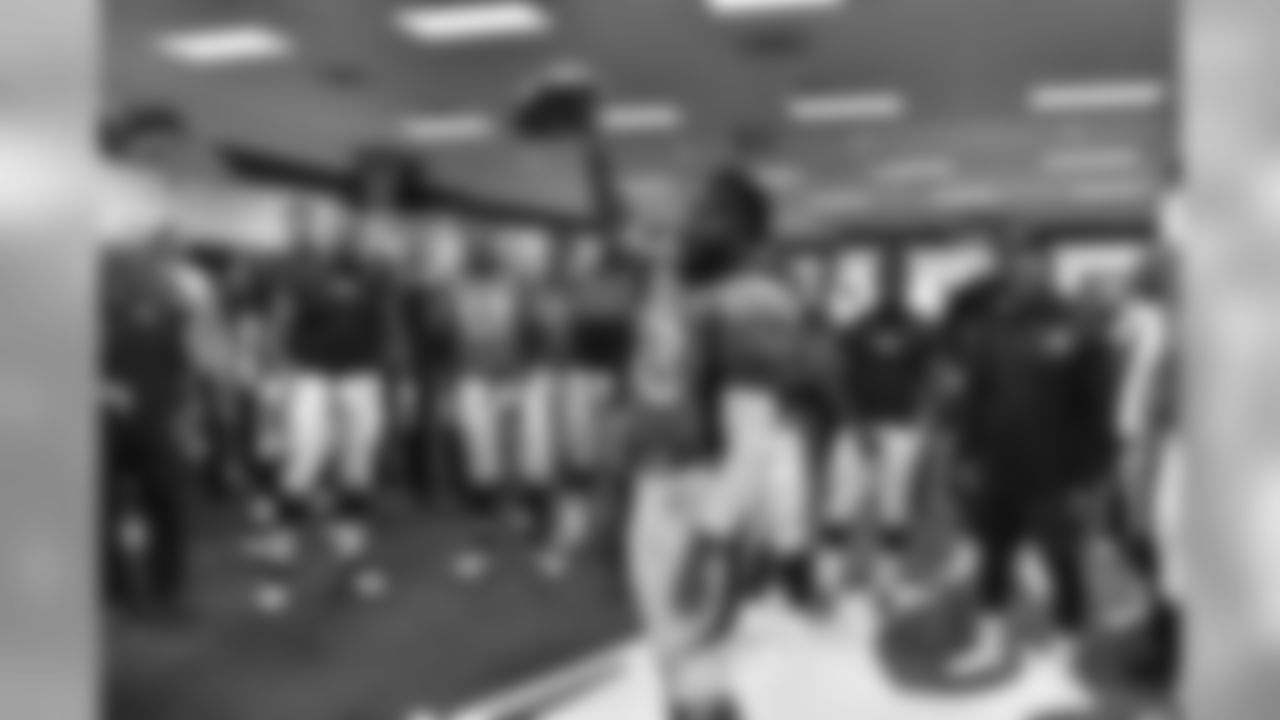 Head Coach Gary Kubiak address the players in the locker room after Denver defeated Minnesota 23-20 in the game at Sports Authority Field in Denver on October 4, 2015. (Photo: © Eric Lars Bakke)