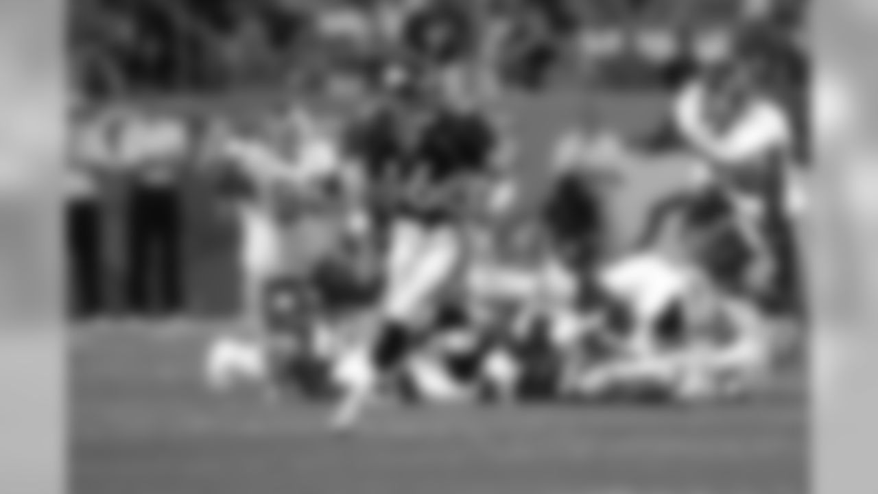 Jake Plummer scrambles during a 2004 game against Kansas City. During his four seasons in Denver, Plummer made one Pro Bowl and helped lead the Broncos to the 2005 AFC Championship game. In 2019 he was selected to the Broncos Top 100 Team.