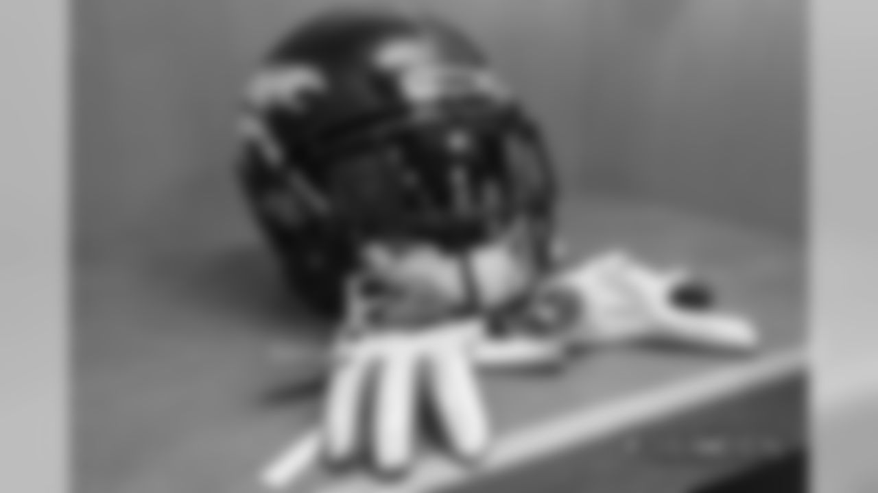 Chris Harris Jr.'s helmet and gloves in the locker room pregame before the Broncos' Week 2 game against the Oakland Raiders at Broncos Stadium at Mile High on September 16, 2018.