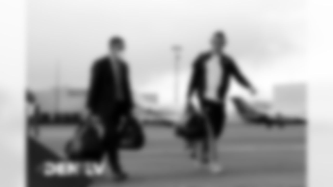 Chief Communications Officer Patrick Smyth and Drew Lock on the tarmac at Denver International Airport on November 14, 2020 during the team's travel to Las Vegas for a Week 10 game against the Raiders. (Photo by Joe Abdellah)