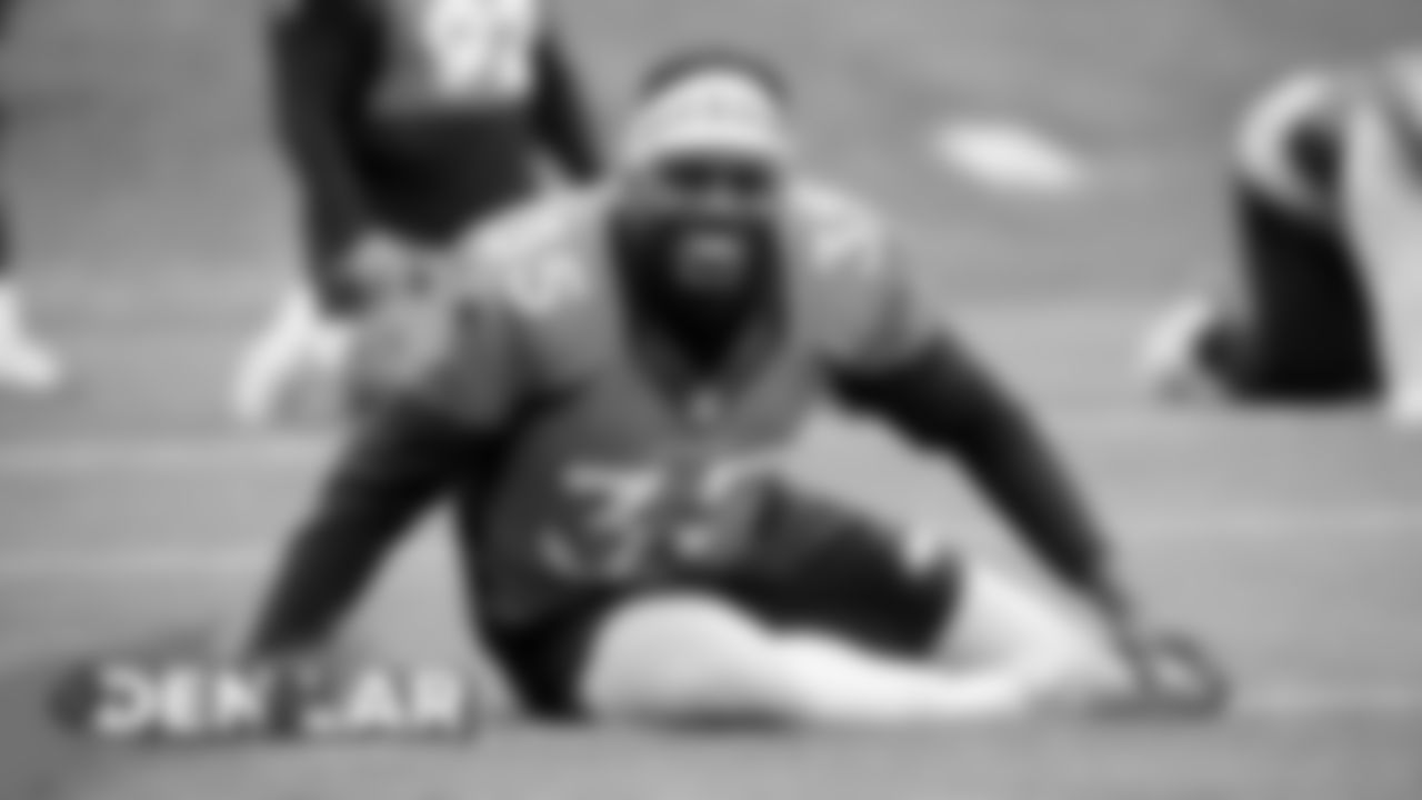 Dymonte Thomas stretches during practice on August 21, 2019 at UCHealth Training Center.